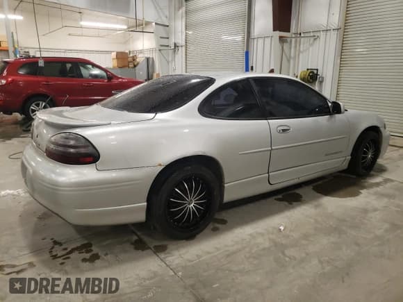 ✅ 2001 Pontiac Grand Prix GT • VIN: 1G2WP12K41F236700 • Lot: 90725125. Listed on Copart with 1,786,650 mi. Free auction sales archive from the USA and detailed vehicle history report at DreamBid. Image 3.