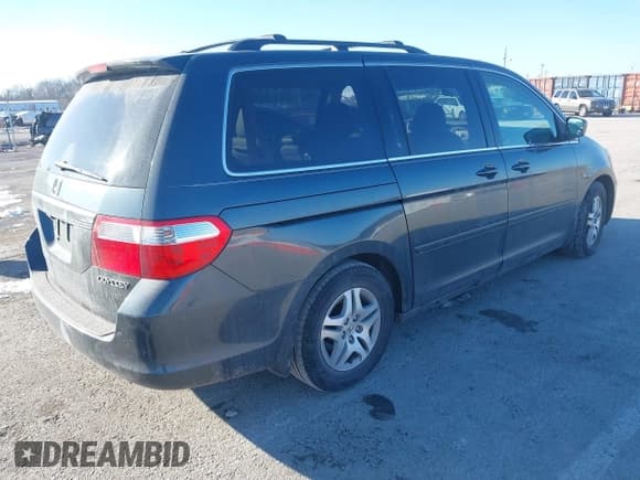 ✅ 2005 Honda Odyssey EX-L • VIN: 5FNRL38795B135505 • Lot: 43860923. Listed on IAAI with 223,573 mi. Free auction sales archive from the USA and detailed vehicle history report at DreamBid. Image 4.