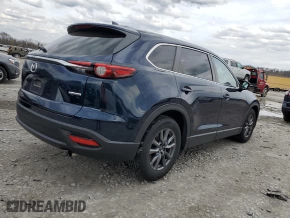 ✅ 2020 Mazda CX-9 Sport • VIN: JM3TCBBY2L0409454 • Лот: 50817055. Опубликован ранее на Copart с пробегом 74 165 миль. Бесплатный доступ к архиву аукционных продаж из США и подробный отчёт об истории автомобиля на DreamBid. Изображение 3.