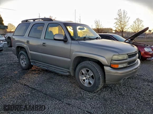 ✅ 2003 Chevrolet Tahoe Z71 • VIN: 1GNEK13TX3R295448 • Lot: 96399615. Listed on Copart with 287,670 mi. Free auction sales archive from the USA and detailed vehicle history report at DreamBid. Image 4.