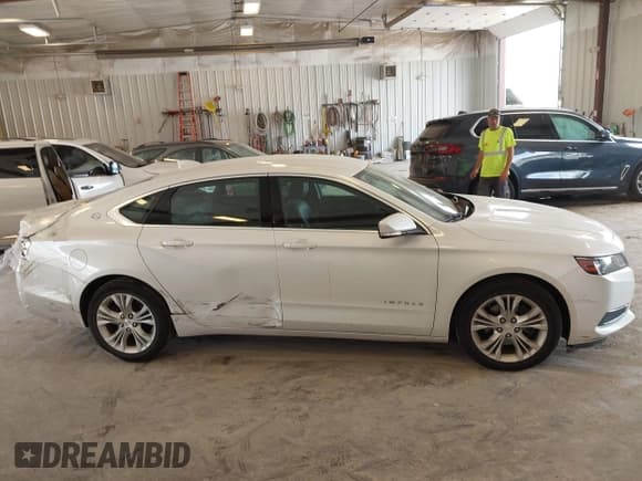 ✅ 2015 Chevrolet Impala LT • VIN: 1G1115SLXFU114815 • Lot: 42734350. Listed on IAAI with 192,818 mi. Free auction sales archive from the USA and detailed vehicle history report at DreamBid. Image 13.