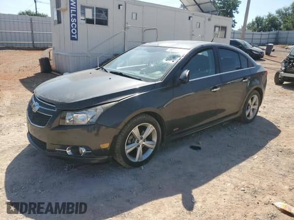 ✅ 2014 Chevrolet Cruze 2LT • VIN: 1G1PE5SBXE7324222 • Lot: 80117375. Listed on Copart with 100,638 mi. Free auction sales archive from the USA and detailed vehicle history report at DreamBid. Image 1.