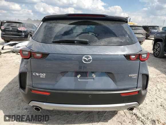 ✅ 2024 Mazda CX-50 Meridian Edition • VIN: 7MMVABXY1RN229345 • Lot: 85894055. Wystawiony na Copart z przebiegiem 3 962 mil. Bezpłatny archiwum sprzedaży aukcyjnych z USA i szczegółowy raport historii pojazdu na DreamBid. Zdjęcie 6.