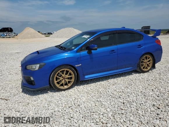 ✅ 2015 Subaru WRX STI Launch • VIN: JF1VA2W61F9804750 • Lot: 51787444. Listed on Copart with 106,131 mi. Free auction sales archive from the USA and detailed vehicle history report at DreamBid. Image 1.