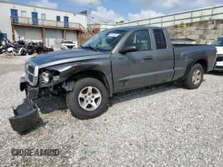 2006 Dodge Dakota SLT with VIN 1D7HE42K66S519339, listed as a Copart auction lot 65167425 with 141,132 mi miles and Salvage title. Bid and sale history available at DreamBid. Image 1.