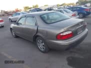 ✅ 2002 Mazda 626 LX • VIN: 1YVGF22C625303882 • Lot: 42696726. Listed on IAAI with 243,982 mi. Free auction sales archive from the USA and detailed vehicle history report at DreamBid. Image 3.