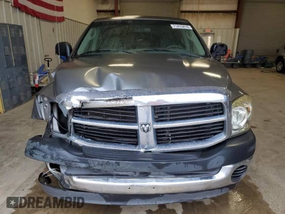 2007 Dodge 1500 ST z VIN 1D7HA18K87J598540, wystawiony jako Copart lot #71415414 z przebiegiem 177 415 mil mil oraz Szkoda całkowita • Salvage title. Historia ofert i sprzedaży dostępna na DreamBid. Obrazek 5.