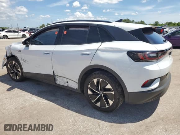 ✅ 2022 Volkswagen ID.4 Pro • VIN: WVGRMPE20NP064371 • Lot: 68587665. Wystawiony na Copart z przebiegiem 51 378 mil. Bezpłatny archiwum sprzedaży aukcyjnych z USA i szczegółowy raport historii pojazdu na DreamBid. Zdjęcie 2.