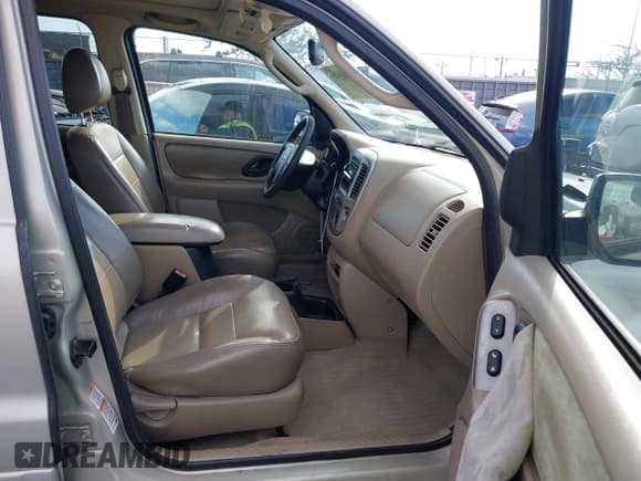 ✅ 2004 Ford Escape Limited • VIN: 1FMCU04104KA41934 • Lot: 41444706. Listed on IAAI with 169,347 mi. Free auction sales archive from the USA and detailed vehicle history report at DreamBid. Image 5.