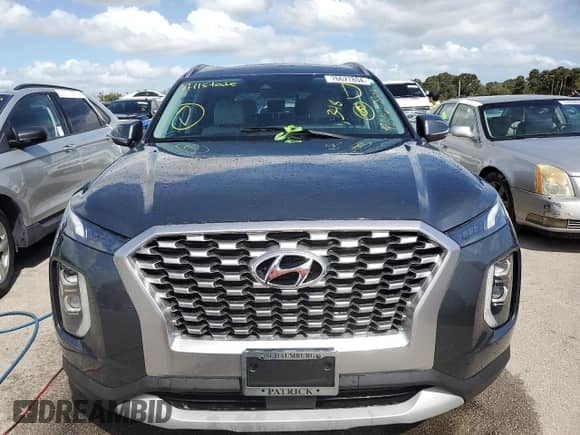 2022 Hyundai Palisade SEL с VIN KM8R2DHE2NU407323, выставлен на аукционе Copart как лот 76627804 с пробегом 20 706 миль миль и Списание • Salvage title. История ставок и продаж доступна на DreamBid. Изображение 5.