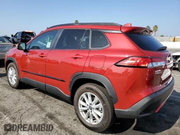 ✅ 2023 Toyota Corolla Cross LE • VIN: 7MUCAAAG9PV041008 • Лот: 85425225. Опубликован ранее на Copart с пробегом 1 022 миль. Бесплатный доступ к архиву аукционных продаж из США и подробный отчёт об истории автомобиля на DreamBid. Изображение 2.