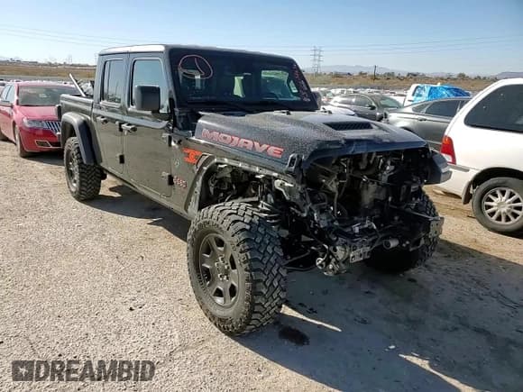 ✅ 2020 Jeep Gladiator Mojave • VIN: 1C6JJTEG1LL209606 • Lot: 88265265. Listed on Copart with 57,098 mi. Free auction sales archive from the USA and detailed vehicle history report at DreamBid. Image 10.