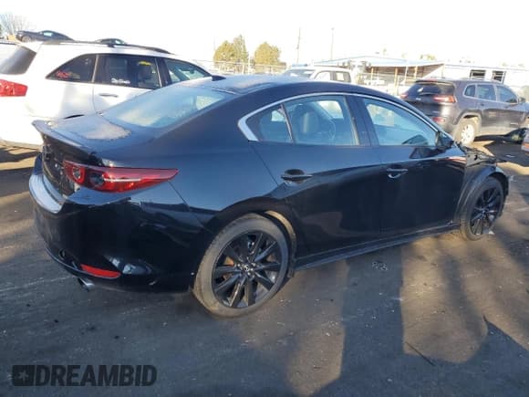 ✅ 2021 Mazda 3 2.5 Turbo • VIN: 3MZBPBAY9MM252687 • Lot: 82180654. Listed on Copart with 27,349 mi. Free auction sales archive from the USA and detailed vehicle history report at DreamBid. Image 3.