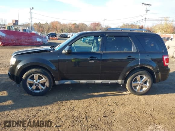 ✅ 2010 Ford Escape Limited • VIN: 1FMCU9EGXAKB80035 • Lot: 43565237. Listed on IAAI with 156,901 mi. Free auction sales archive from the USA and detailed vehicle history report at DreamBid. Image 14.