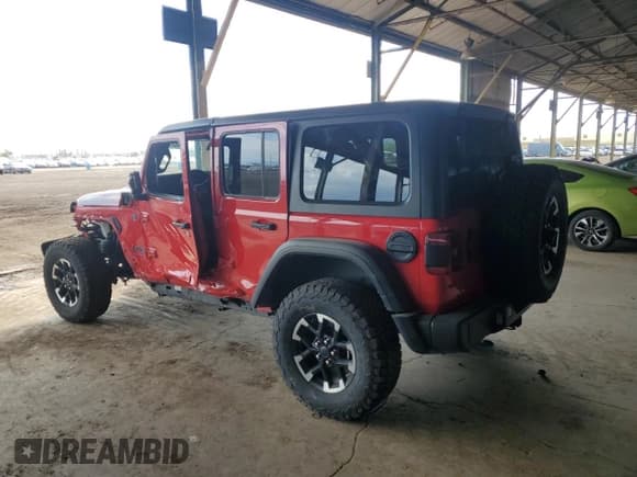 ✅ 2024 Jeep Wrangler Rubicon X • VIN: 1C4RJXR60RW292120 • Lot: 80897355. Wystawiony na Copart z przebiegiem 31 286 mil. Bezpłatny archiwum sprzedaży aukcyjnych z USA i szczegółowy raport historii pojazdu na DreamBid. Zdjęcie 2.