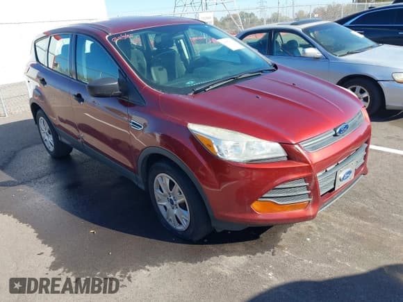 ✅ 2014 Ford Escape S • VIN: 1FMCU0F74EUA21144 • Lot: 43652113. Listed on IAAI with 179,090 mi. Free auction sales archive from the USA and detailed vehicle history report at DreamBid. Image 1.