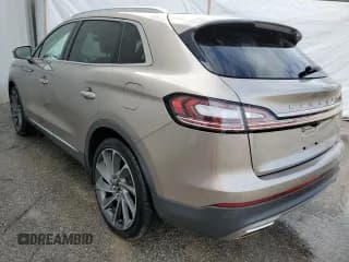 ✅ 2019 Lincoln Nautilus Reserve • VIN: 2LMPJ6LP0KBL17821 • Лот: 64954332. Опубликован ранее на Copart с пробегом 35 620 миль. Бесплатный доступ к архиву аукционных продаж из США и подробный отчёт об истории автомобиля на DreamBid. Изображение 3.