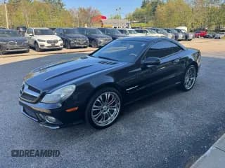 ✅ 2009 Mercedes-Benz SL 550 • VIN: WDBSK71F69F148290 • Лот: 93726125. Опубликован ранее на Copart с пробегом 161 833 миль. Бесплатный доступ к архиву аукционных продаж из США и подробный отчёт об истории автомобиля на DreamBid. Изображение 2.