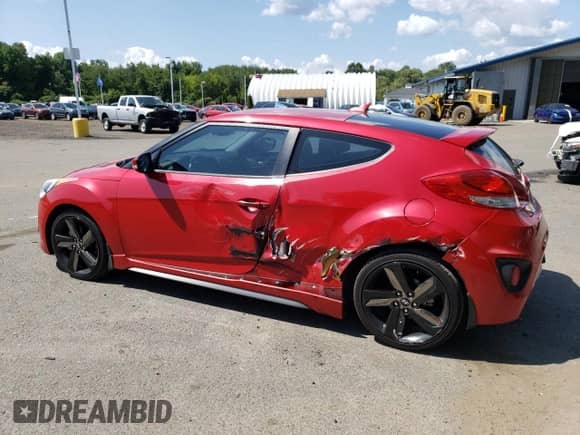 2014 Hyundai Veloster Turbo z VIN KMHTC6AE0EU200020, wystawiony jako Copart lot #68376134 z przebiegiem 90 733 mil mil oraz Szkoda całkowita • Salvage title. Historia ofert i sprzedaży dostępna na DreamBid. Obrazek 2.