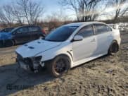 ✅ 2012 Mitsubishi Lancer Evolution GSR • VIN: JA32W8FV7CU030939 • Lot: 45256925. Listed on Copart with 201,983 mi. Free auction sales archive from the USA and detailed vehicle history report at DreamBid. Image 1.