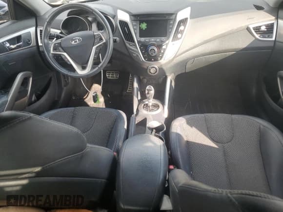 ✅ 2012 Hyundai Veloster w/Red Int • VIN: KMHTC6AD5CU070322 • Lot: 72615764. Wystawiony na Copart z przebiegiem Nie podano. Bezpłatny archiwum sprzedaży aukcyjnych z USA i szczegółowy raport historii pojazdu na DreamBid. Zdjęcie 8.