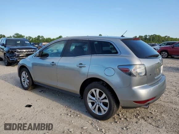 ✅ 2010 Mazda CX-7 Touring • VIN: JM3ER2W33A0351177 • Лот: 62200645. Опубликован ранее на Copart с пробегом 128 011 миль. Бесплатный доступ к архиву аукционных продаж из США и подробный отчёт об истории автомобиля на DreamBid. Изображение 2.