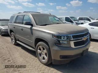 2017 Chevrolet Tahoe LS with VIN 1GNSCAKC6HR227222, listed as a IAAI auction lot 43497874 with 214,576 mi miles and . Bid and sale history available at DreamBid. Image 1.