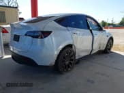 ✅ 2022 Tesla Model Y Long Range • VIN: 7SAYGDEE8NA021164 • Lot: 43483473. Listed on IAAI with 42,531 mi. Free auction sales archive from the USA and detailed vehicle history report at DreamBid. Image 4.