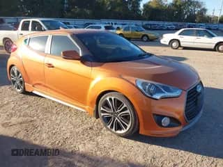 2016 Hyundai Veloster Turbo z VIN KMHTC6AE7GU293136, wystawiony jako IAAI lot #43617436 z przebiegiem 104 577 mil mil oraz . Historia ofert i sprzedaży dostępna na DreamBid. Obrazek 1.