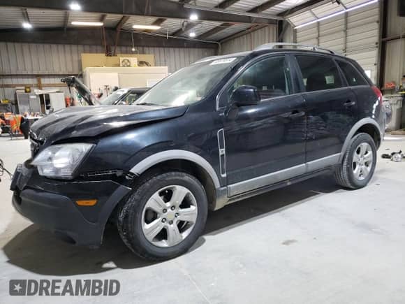 2014 Chevrolet Captiva Sport LS с VIN 3GNAL2EKXES607953, выставлен на аукционе Copart как лот 83879514 с пробегом Не указан миль и Списание • Salvage title. История ставок и продаж доступна на DreamBid. Изображение 1.