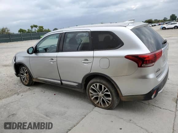 2018 Mitsubishi Outlander ES z VIN JA4AZ3A34JZ040495, wystawiony jako Copart lot #71119415 z przebiegiem 161 625 mil mil oraz Szkoda całkowita • Salvage title. Historia ofert i sprzedaży dostępna na DreamBid. Obrazek 2.