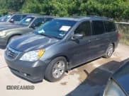 ✅ 2010 Honda Odyssey Touring • VIN: 5FNRL3H90AB057238 • Lot: 42496055. Listed on IAAI with 183,465 mi. Free auction sales archive from the USA and detailed vehicle history report at DreamBid. Image 2.