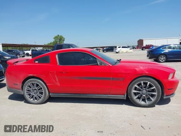 ✅ 2012 Ford Mustang GT Premium • VIN: 1ZVBP8CF5C5216031 • Lot: 42880817. Listed on IAAI with 127,381 mi. Free auction sales archive from the USA and detailed vehicle history report at DreamBid. Image 13.