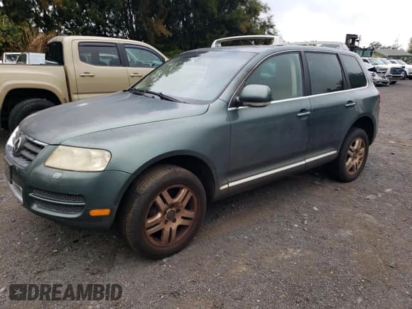 ✅ 2006 Volkswagen Touareg 4.2L V8 • VIN: WVGZM77L16D049631 • Lot: 84882844. Listed on Copart with Not provided. Free auction sales archive from the USA and detailed vehicle history report at DreamBid. Image 1.