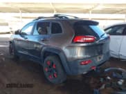 ✅ 2016 Jeep Cherokee Trailhawk • VIN: 1C4PJMBSXGW246224 • Lot: 43837921. Listed on IAAI with 104,876 mi. Free auction sales archive from the USA and detailed vehicle history report at DreamBid. Image 3.