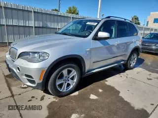 ✅ 2012 BMW X5 35d • VIN: 5UXZW0C53CL674271 • Lot: 84986405. Listed on Copart with 129,795 mi. Free auction sales archive from the USA and detailed vehicle history report at DreamBid. Image 1.