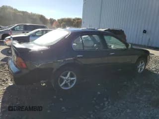 ✅ 1996 Nissan Maxima GXE • VIN: JN1CA21D0TT748518 • Lot: 76619604. Listed on Copart with 198,051 mi. Free auction sales archive from the USA and detailed vehicle history report at DreamBid. Image 3.