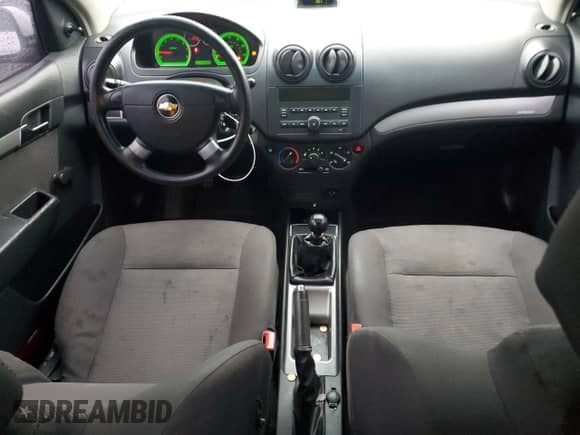 2009 Chevrolet Aveo 1LT z VIN KL1TD56E29B382736, wystawiony jako Copart lot #87038674 z przebiegiem 177 623 mil mil oraz Szkoda całkowita • Salvage title. Historia ofert i sprzedaży dostępna na DreamBid. Obrazek 8.