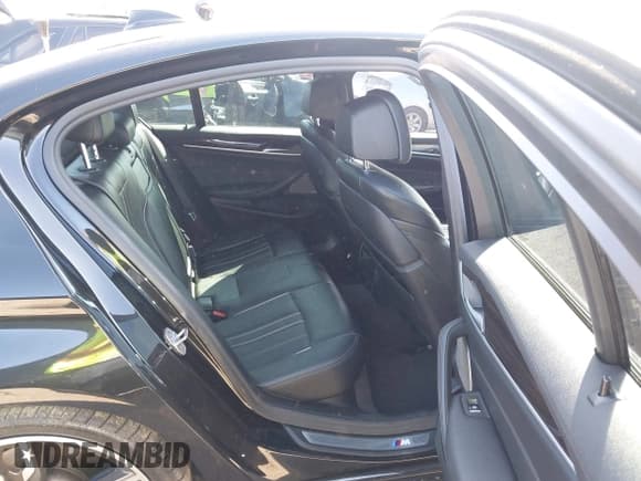 ✅ 2019 BMW 5 Series M550i xDrive • VIN: WBAJB9C52KB289011 • Лот: 43335639. Опубликован ранее на IAAI с пробегом 65 170 миль. Бесплатный доступ к архиву аукционных продаж из США и подробный отчёт об истории автомобиля на DreamBid. Изображение 8.