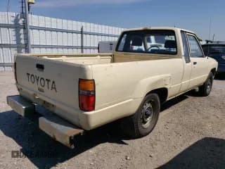 ✅ 1984 Toyota Pickup Deluxe • VIN: JT4RN56D6E5005133 • Лот: 60706624. Опубликован ранее на Copart с пробегом 176 803 миль. Бесплатный доступ к архиву аукционных продаж из США и подробный отчёт об истории автомобиля на DreamBid. Изображение 3.