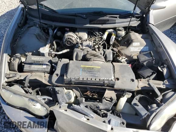 2002 Chevrolet Camaro z VIN 2G1FP22K422119101, wystawiony jako Copart lot #77315824 z przebiegiem 187 094 mil mil oraz Szkoda całkowita • Salvage title. Historia ofert i sprzedaży dostępna na DreamBid. Obrazek 11.