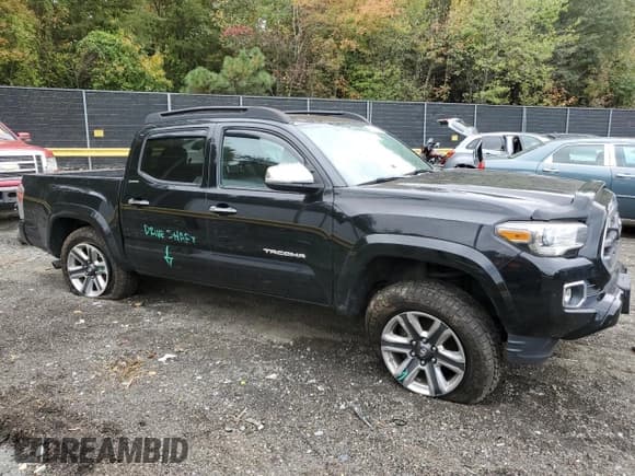 ✅ 2017 Toyota Tacoma Limited • VIN: 3TMGZ5AN4HM067611 • Lot: 86181825. Listed on Copart with 206,321 mi. Free auction sales archive from the USA and detailed vehicle history report at DreamBid. Image 4.