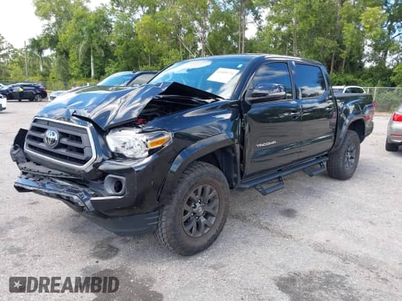 2022 Toyota Tacoma SR5 with VIN 3TMAZ5CN4NM164094, listed as a IAAI auction lot 43409274 with 38,585 mi miles and . Bid and sale history available at DreamBid. Image 17.