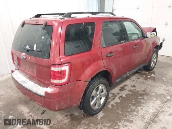 ✅ 2008 Ford Escape XLT • VIN: 1FMCU03198KC81619 • Lot: 43872448. Listed on IAAI with 209,267 mi. Free auction sales archive from the USA and detailed vehicle history report at DreamBid. Image 4.