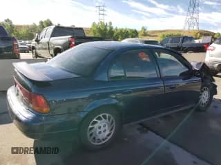 ✅ 1999 Saturn SL • VIN: 1G8ZJ5272XZ141986 • Лот: 71496674. Опубликован ранее на Copart с пробегом Не указан. Бесплатный доступ к архиву аукционных продаж из США и подробный отчёт об истории автомобиля на DreamBid. Изображение 3.