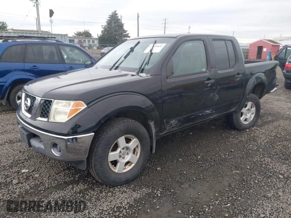 ✅ 2005 Nissan Frontier Nismo • VIN: 1N6AD07W55C411044 • Lot: 43599846. Listed on IAAI with 128,957 mi. Free auction sales archive from the USA and detailed vehicle history report at DreamBid. Image 2.
