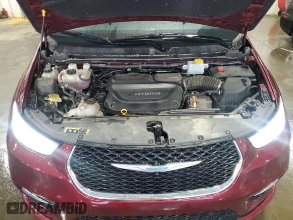 ✅ 2021 Chrysler Pacifica Hybrid Touring L • VIN: 2C4RC1L70MR599507 • Lot: 67760615. Wystawiony na Copart z przebiegiem 131 509 mil. Bezpłatny archiwum sprzedaży aukcyjnych z USA i szczegółowy raport historii pojazdu na DreamBid. Zdjęcie 12.