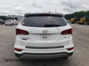 ✅ 2018 Hyundai Santa Fe 2.4L • VIN: 5XYZU3LB4JG515976 • Лот: 64852354. Опубликован ранее на Copart с пробегом 145 375 миль. Бесплатный доступ к архиву аукционных продаж из США и подробный отчёт об истории автомобиля на DreamBid. Изображение 6.