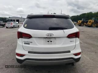 ✅ 2018 Hyundai Santa Fe 2.4L • VIN: 5XYZU3LB4JG515976 • Лот: 64852354. Опубликован ранее на Copart с пробегом 145 375 миль. Бесплатный доступ к архиву аукционных продаж из США и подробный отчёт об истории автомобиля на DreamBid. Изображение 6.