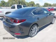 ✅ 2023 Mazda 3 S Carbon Edition • VIN: 3MZBPACM9PM377388 • Lot: 43347186. Listed on IAAI with 32,175 mi. Free auction sales archive from the USA and detailed vehicle history report at DreamBid. Image 4.